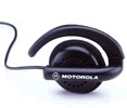 A black motorola headphones sitting on top of a table.