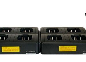 A group of four batteries sitting on top of each other.