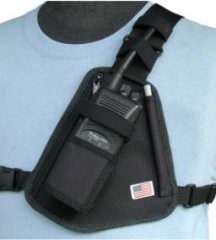 A man wearing a radio chest harness.