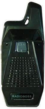 A black plastic box with a cell phone on top of it.