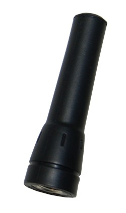 A black microphone is on the side of a white wall.
