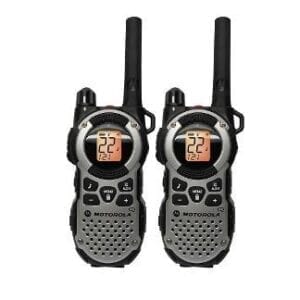 A pair of walkie talkies are on the ground.