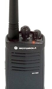 A motorola walkie talkie is shown with the antenna on.