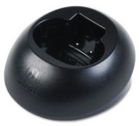 A black plastic bowl with a cell phone charger.