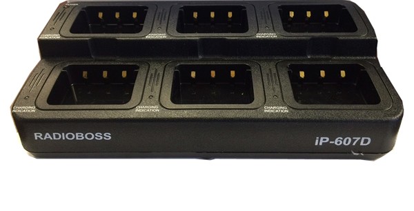 A close up of an eight bay battery charger
