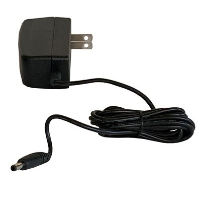 A black wall charger with a cord attached to it.